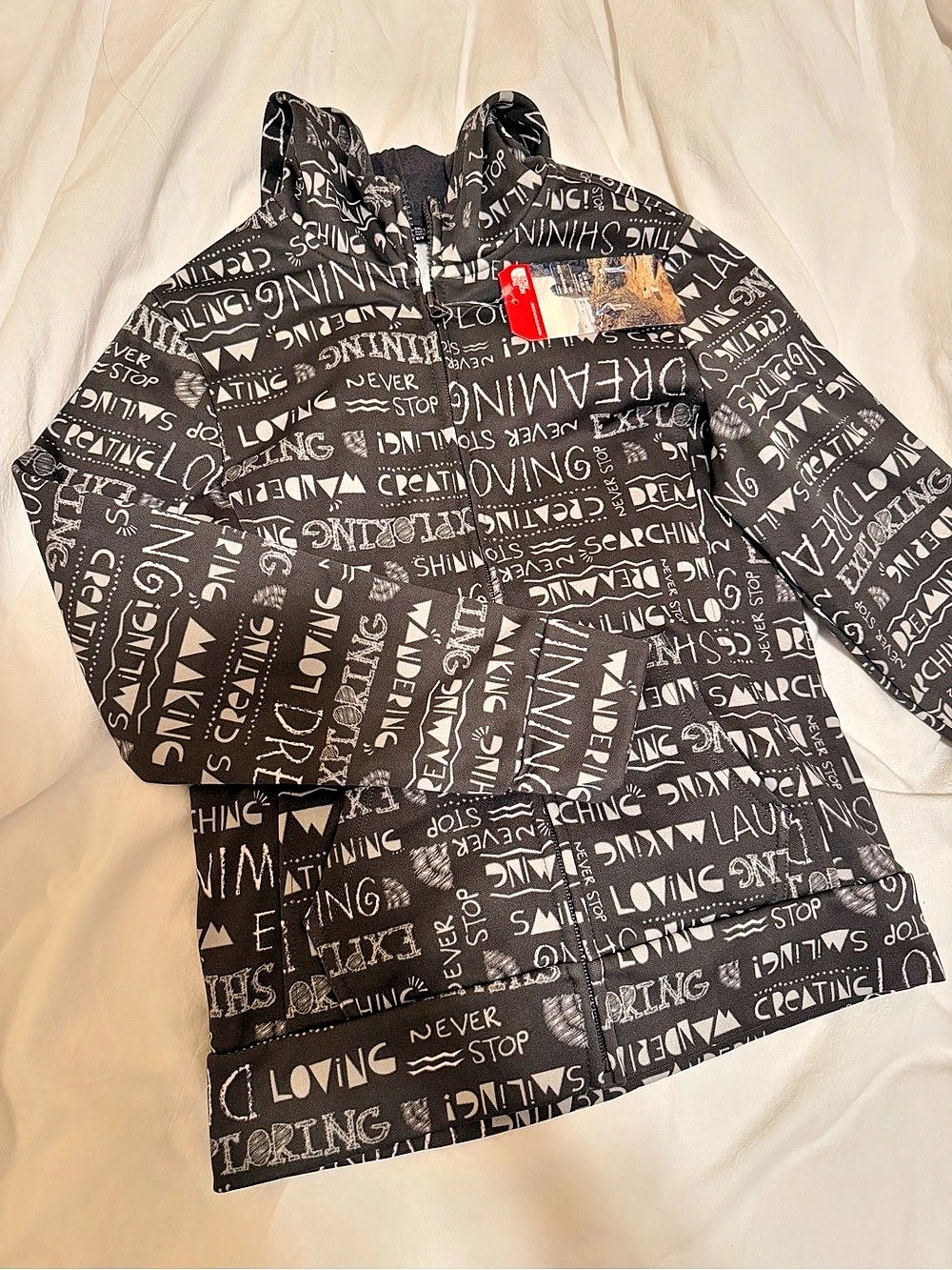 The North Face Never Stop Exploring Printed Jacket Kids Printed Winter Jacket